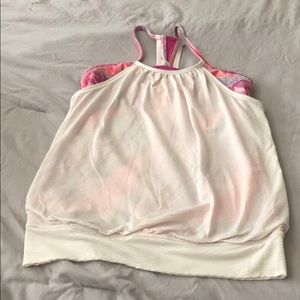 Beautiful white Ivivva top with pink lining